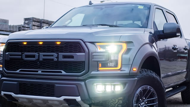 Why is Ford stock surging despite a $1.3 billion loss?