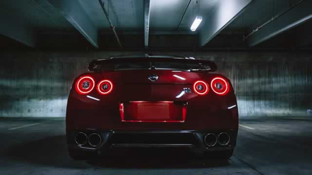 Nissan posts narrow profit for full business year